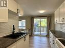 #215 Hawthorne Lane - 3505 38 Street Unit# 215, Vernon, BC  - Indoor Photo Showing Kitchen With Double Sink 