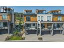 Welcome to 4-105 Predator Ridge Drive. Live full time or put it in rental pool! - 105 Predator Ridge Drive Unit# 4, Vernon, BC  - Outdoor 