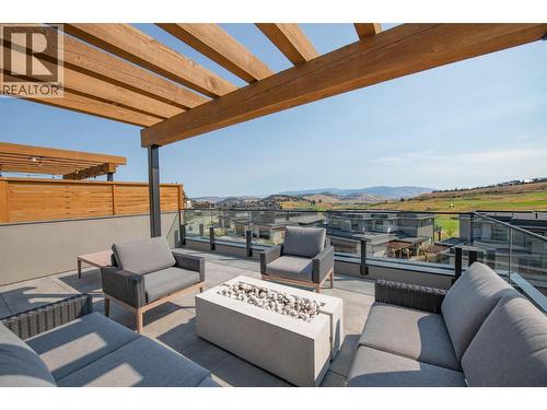 Fabulous views from roof top patio - 105 Predator Ridge Drive Unit# 4, Vernon, BC - Outdoor With Deck Patio Veranda With View With Exterior