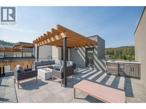 Gas hook ups for fire table as well as BBQ - 105 Predator Ridge Drive Unit# 4, Vernon, BC - Outdoor With Deck Patio Veranda