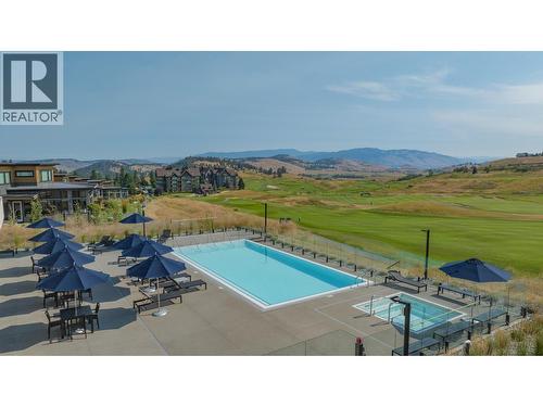 Fieldglass pool and hot tub - 105 Predator Ridge Drive Unit# 4, Vernon, BC - Outdoor With In Ground Pool With View