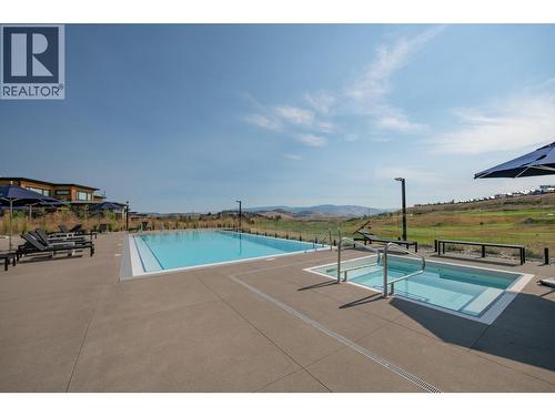 105 Predator Ridge Drive Unit# 4, Vernon, BC - Outdoor With In Ground Pool With View
