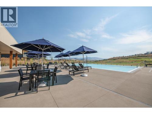 105 Predator Ridge Drive Unit# 4, Vernon, BC - Outdoor With In Ground Pool