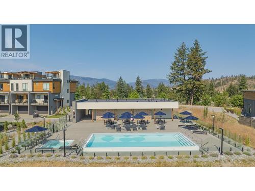 105 Predator Ridge Drive Unit# 4, Vernon, BC - Outdoor With In Ground Pool
