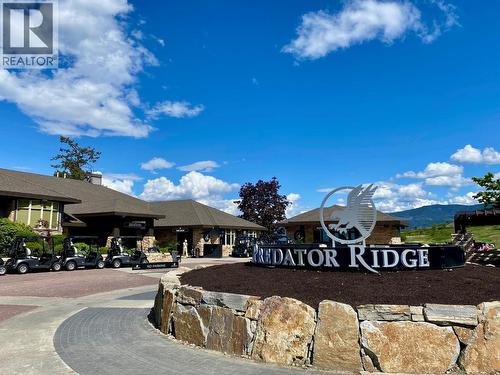 Resort welcome circle for pro shop, clubhouse and Ridge and Pallinos Restaurants - 105 Predator Ridge Drive Unit# 4, Vernon, BC - Outdoor
