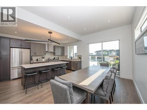 Fully equipped kitchen and fully furnished - 105 Predator Ridge Drive Unit# 4, Vernon, BC - Indoor Photo Showing Other Room