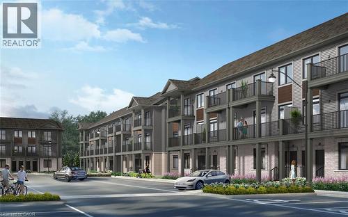 View of building exterior with uncovered parking - 235 Blair Creek Drive Unit# 12, Kitchener, ON - Outdoor With Facade
