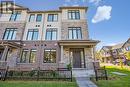 Executive end unit townhouse - 2180 Postmaster Drive, Oakville, ON  - Outdoor With Facade 