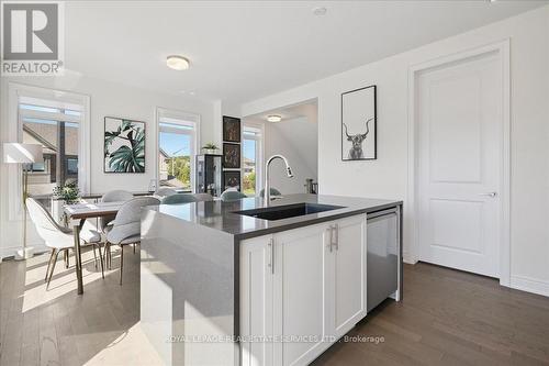 Laundry off the kitchen - 2180 Postmaster Drive, Oakville, ON - Indoor Photo Showing Kitchen
