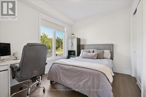 Main level bedroom with ensuite - 2180 Postmaster Drive, Oakville, ON - Indoor Photo Showing Bedroom