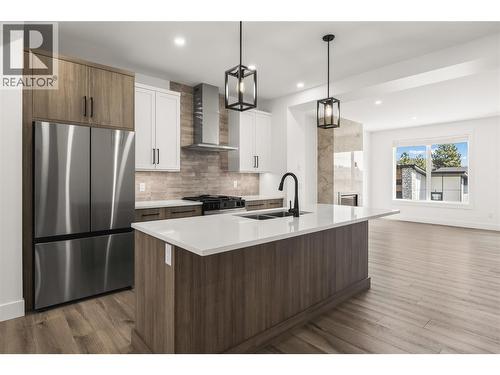 3 bed | 3 baths | 1,608 sqft - 2835 Canyon Crest Drive Unit# 17, West Kelowna, BC - Indoor Photo Showing Kitchen With Stainless Steel Kitchen With Double Sink With Upgraded Kitchen