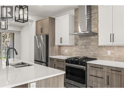 Kitchen - 2835 Canyon Crest Drive Unit# 17, West Kelowna, BC - Indoor Photo Showing Kitchen With Stainless Steel Kitchen With Double Sink With Upgraded Kitchen