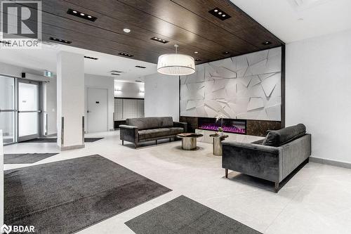 Building lobby featuring wood ceiling and recessed lighting - 58 Lakeside Terrace Unit# 201, Barrie, ON - Indoor Photo Showing Other Room