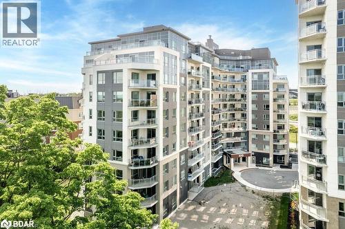 View of apartment building / complex - 58 Lakeside Terrace Unit# 201, Barrie, ON - Outdoor With Balcony