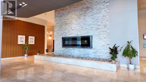2803 - 220 Burnhamthorpe Road W, Mississauga, ON - Indoor With Fireplace