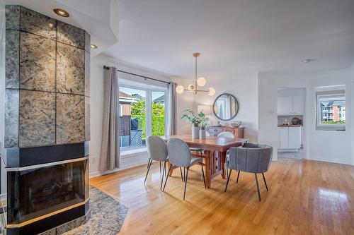 Dining room - 427  - 431 Rue François-V.-Malhiot, Boucherville, QC - Indoor Photo Showing Dining Room With Fireplace