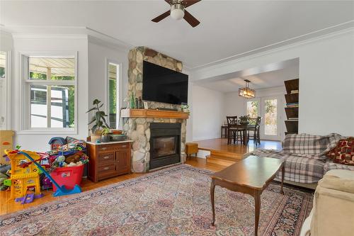 1065 Bx Road, Vernon, BC - Indoor Photo Showing Living Room With Fireplace