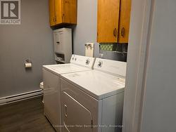 Main Floor Laundry & 2 pc bathroom - 