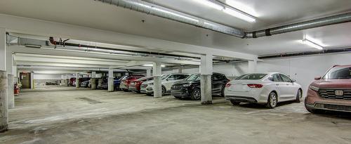 Parking - 104-3228 Rue Ste-Émilie, Saguenay (Jonquière), QC - Indoor Photo Showing Garage