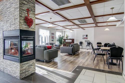 Hall - 209-3228 Rue Ste-Émilie, Saguenay (Jonquière), QC - Indoor With Fireplace