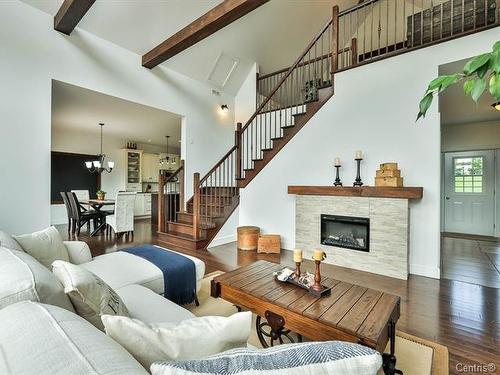 Overall view - 2060Z Côte St-Victor, Papineauville, QC - Indoor Photo Showing Living Room With Fireplace