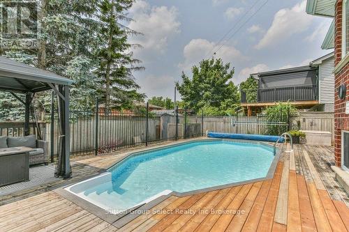 21 Heron Avenue, Woodstock (Woodstock - North), ON - Outdoor With Above Ground Pool With Deck Patio Veranda