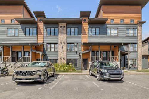 Parking - 302-1692 Boul. Pie-Xi N., Québec (La Haute-Saint-Charles), QC - Outdoor With Facade