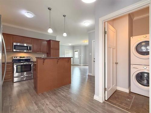 4 250 7Th Avenue N, Virden, MB - Indoor Photo Showing Laundry Room