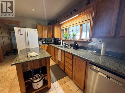 149 49 Highway, Dawson Creek, BC - Indoor Photo Showing Kitchen With Double Sink
