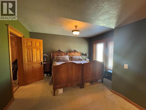 149 49 Highway, Dawson Creek, BC - Indoor Photo Showing Bedroom