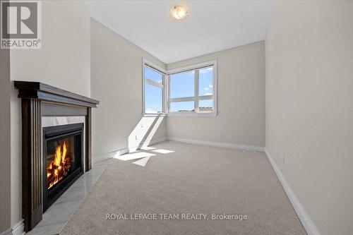 227 Bert Hall Street, Arnprior, ON - Indoor Photo Showing Other Room With Fireplace