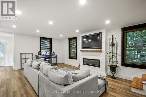 Nothing left to do but enjoy! - 190 Maple Street, Bracebridge (Macaulay), ON - Indoor Photo Showing Other Room With Fireplace