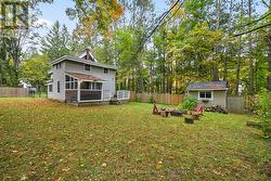 Muskoka room off the home and storage shed on site - 