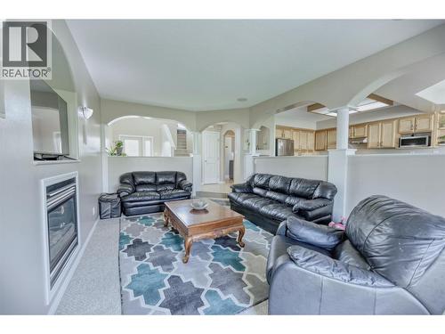 270 Willows Place, Oliver, BC - Indoor Photo Showing Living Room With Fireplace