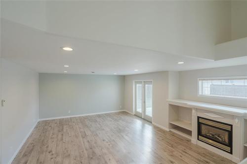 2 Parkside Place, Steinbach, MB - Indoor With Fireplace