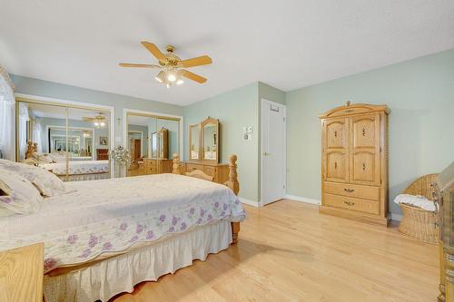 Primary bedroom - 81 Rue Dominyck, Sainte-Agathe-Des-Monts, QC - Indoor Photo Showing Bedroom