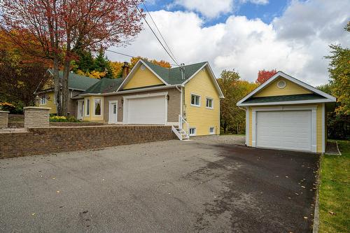 Garage - 81 Rue Dominyck, Sainte-Agathe-Des-Monts, QC - Outdoor With Facade