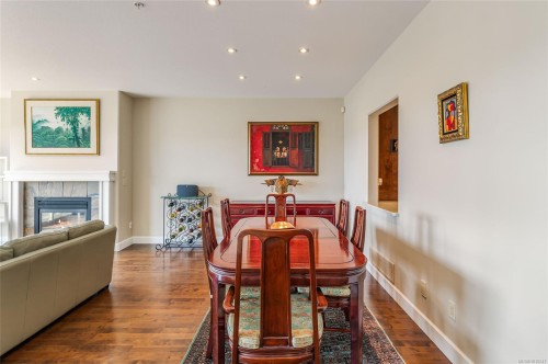 3026 Waterstone Way, Nanaimo, BC - Indoor Photo Showing Dining Room With Fireplace