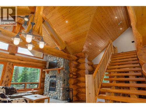 800 Highway 22, Rossland, BC - Indoor Photo Showing Other Room With Fireplace