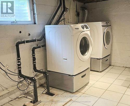 Laundry team, plus sump pump in the utility room. - 302 Main Street E, Grimsby (Grimsby East), ON - Indoor Photo Showing Laundry Room