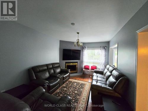 6136 Ford Road, Mississauga, ON - Indoor Photo Showing Living Room With Fireplace