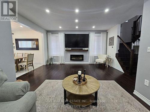 Upper - 105 Whitlock Avenue E, Milton, ON - Indoor Photo Showing Living Room With Fireplace