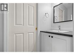 2 piece powder room, with access to ensuite - 