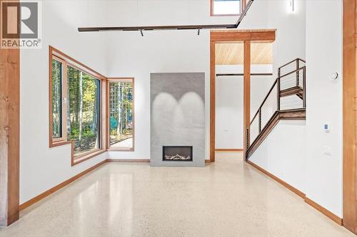 5538 Currie Bowl Way, Fernie, BC - Indoor Photo Showing Other Room With Fireplace