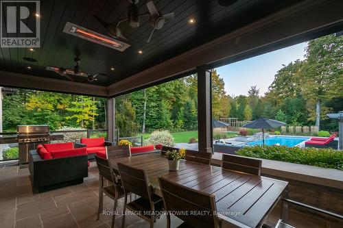 Covered, Heated, Screened In Deck - 13160 Nassagaweya Esquesing Townline, Milton, ON - Outdoor With In Ground Pool With Deck Patio Veranda With Exterior