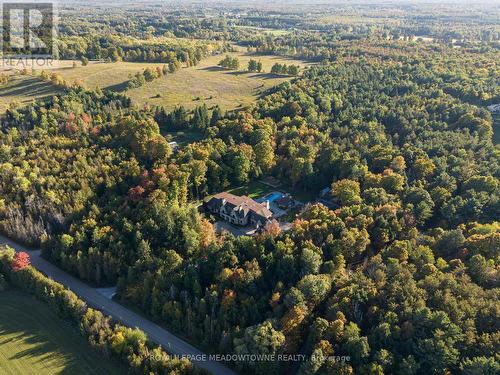 Nestled among 5 private forested acres - 13160 Nassagaweya Esquesing Townline, Milton, ON - Outdoor With Body Of Water With View