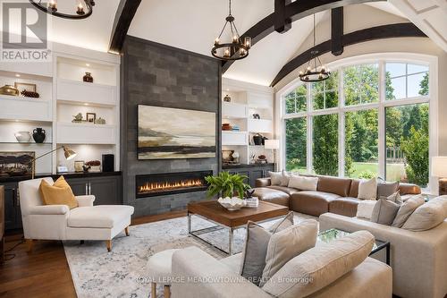 13160 Nassagaweya Esquesing Townline, Milton, ON - Indoor Photo Showing Living Room With Fireplace