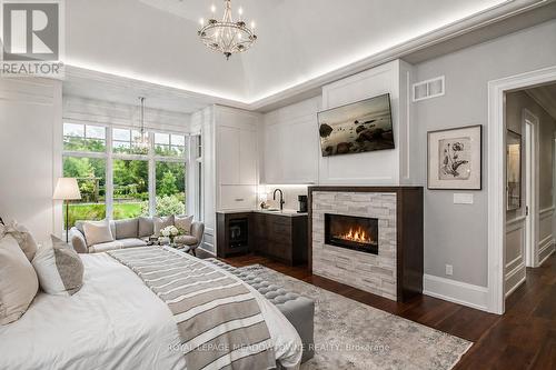 13160 Nassagaweya Esquesing Townline, Milton, ON - Indoor Photo Showing Bedroom With Fireplace