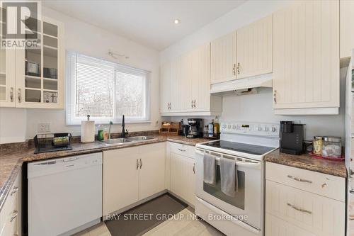 1019 Beach Boulevard, Hamilton, ON - Indoor Photo Showing Kitchen With Double Sink