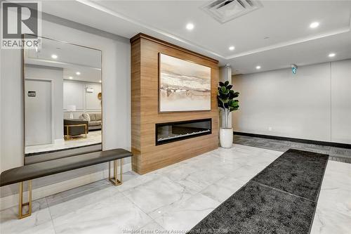 1855 Wyoming Unit# 214, Lasalle, ON - Indoor Photo Showing Other Room With Fireplace